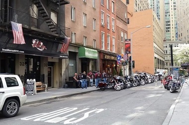 A man was punched by a robber trying to steal his iPhone as he stood outside of the Iron Horse bar.