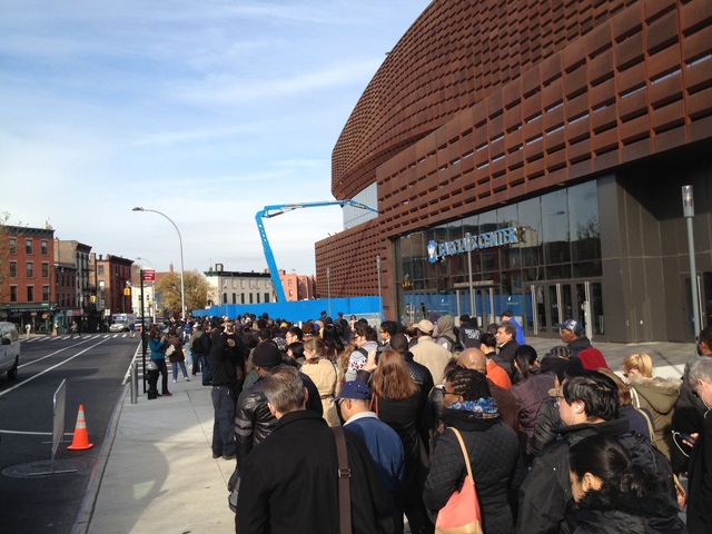 <p>Commuters brave long lines at the Barclays Center waiting for a bus into Manhattan on November 1, 2012.</p>
