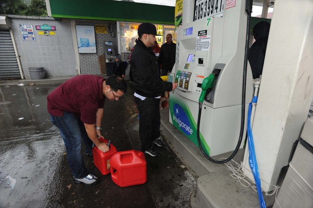 <p>People took their gas cans to a BP station in Williamsburg.</p>

