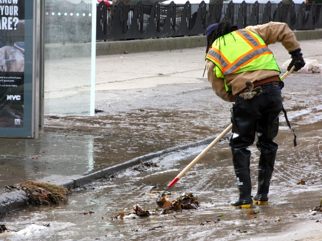 <p>Clean-up crews in Coney Island after Hurricane Sandy.</p>
