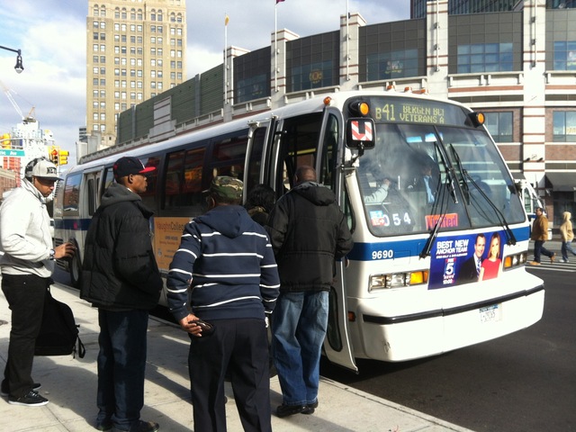 <p>Commuters wait in line to board a bus at Dean Street and Flatbush Avenue Monday morning, Nov. 5, 2012, one week after Hurricane Sandy crippled New York City's mass transit system.</p>
