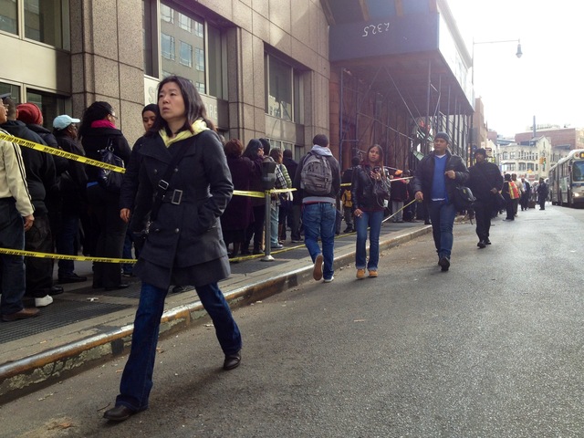 <p>Some commuters were forced to walk to work on November 1, 2012 days after Hurricane Sandy flooded the city's subway system.</p>

