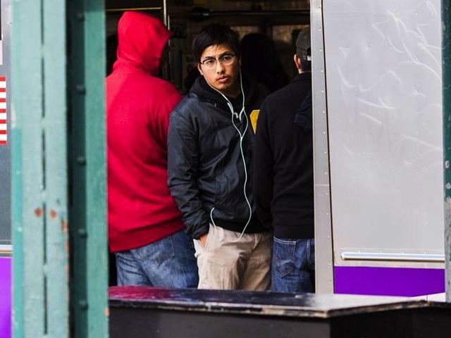 <p>A commuter boards a crowded subway train Monday morning, Nov. 5, 2012, one week after Hurricane Sandy crippled the region's mass transit system.</p>

