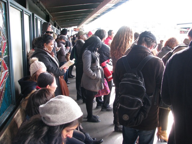 <p>A commuter wait on a crowded subway platform Monday morning, Nov. 5, 2012, one week after Hurricane Sandy crippled the region's mass transit system.</p>
