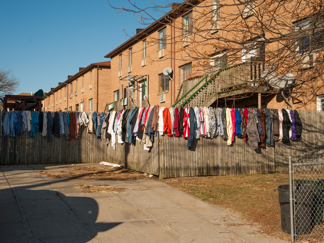 <p>Clothes can be seen drying on a fence on Beach 41st Street on Tuesday Nov. 6, 2012.</p>
