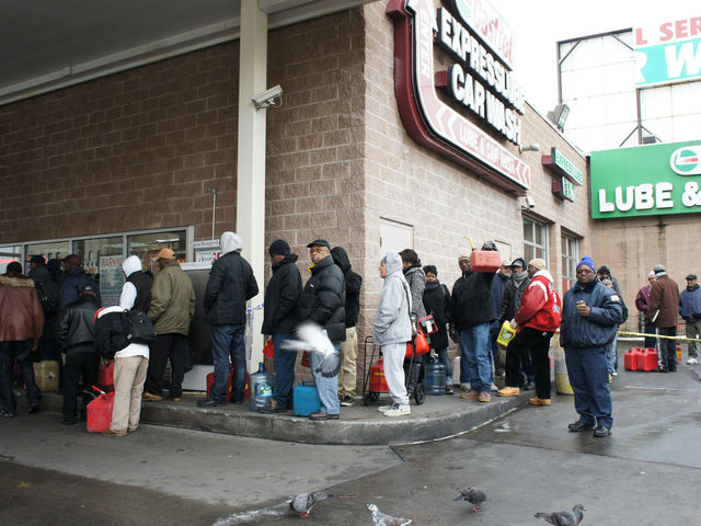 <p>A line at the BP gas station in Crown Heights, as people waited to fill up gas cans, water jugs and Arizona Iced Tea containers.</p>

