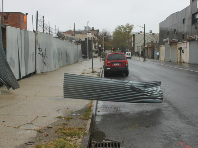 <p>Winds from Hurricane Sandy blew corrugated metal off the fence outside a Verizon building on Carroll Street in Gowanus.</p>
