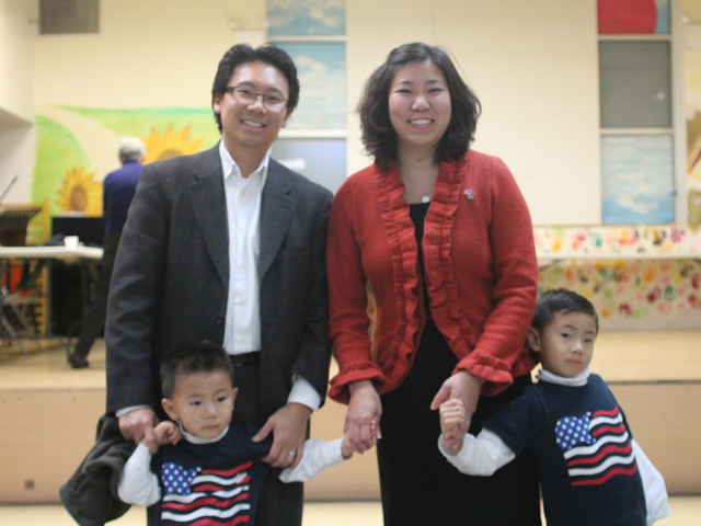 <p>Assemblywoman Grace Meng made an appearance at the Koren Community Services Senior Center in Flushing on Nov. 6, accompanied by her husband Wayne and her sons Brandon (left) and Tyler (right).</p>

