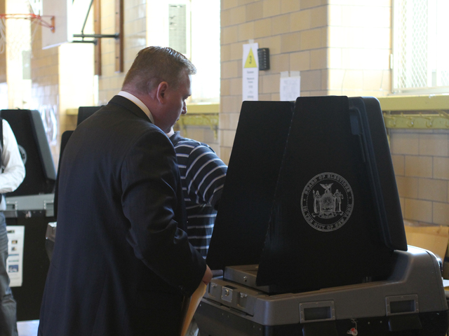 <p>City Councilman Dan Halloran fills out his ballot at P.S. 184 in Whitestone on Nov. 6. Halloran later said that he voted for Republican Mitt Romney for president.</p>
