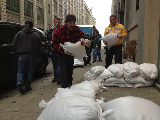 <br />
<p>An emergency crew for Industry City Partners lays sandbags outside one of the company's buildings on Third Avenue on October 28, 2012, in preparation for Hurricane Sandy.</p>
