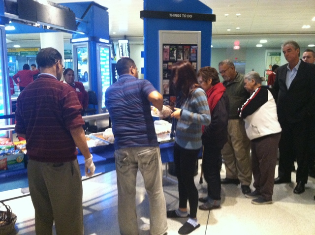 <p>Stranded passengers lined up for free sandwiches at JFK Airport Oct. 31, 2012.</p>
