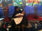 Stranded Travelers Camp Out at JFK Airport for Days