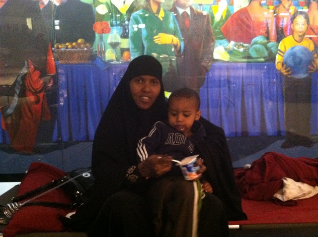 <p>Maryan Olad and her son Mohammed have been sleeping in JFK Airport while trying to get home to Columbus, Ohio, after Hurricane Sandy.</p>
