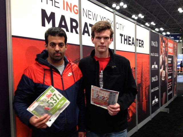 <p>Rick Nunnari, 32, from Bensonhurst and his friend Peter O'Rourke, 25, from Bay Ridge hold their running bibs at the Marathon Expo on November 2, 2012, just a few moments after hearing that the marathon was canceled. "We couldn't be more disappointed," said Nunnari.</p>
