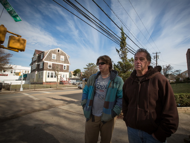 <p>Paul Wade (R), 53, and his son Kyle, said the pub was the heart of the neighborhood.</p>
