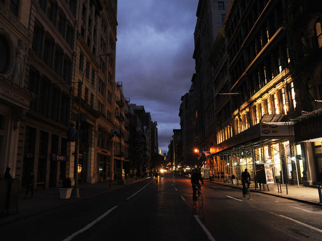 <p>Power appeared on the east side of Broadway looking north just above Houston Street, while the west side of street remained dark Nov. 2, 2012.</p>
