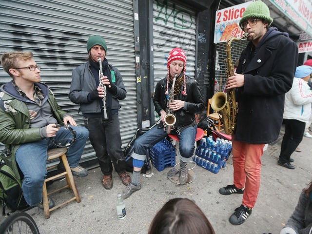 <p>Members of the Rude Mechanical Orchestra perform an impromptu jam session on Avenue C shortly after power was restored in the East Village on November 2, 2012.</p>
