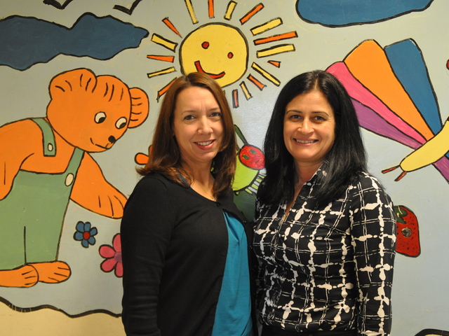 <p>P.S. 132's principal Beth Lubeck and parent coordinator Yvonne Garguilo&nbsp;welcomed back students Monday after one week of no school due to Hurricane Sandy.</p>

