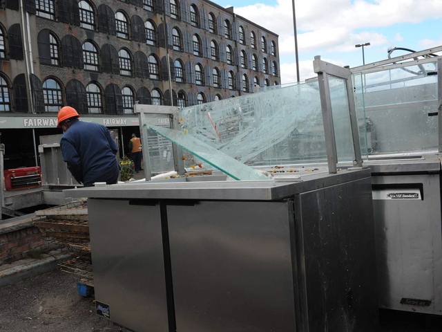 <p>The Fairway parking lot in Red Hook was full of trashed items from the store, which was flooded by Hurricane Sandy Oct. 29, 2012. 'Everything was absolutely gutted,' Fairway vice chairman Howard Glickberg told DNAinfo.com New York. 'There was absolutely nothing left in the old store.' It is slated to reopen March 1, 2013.</p>
