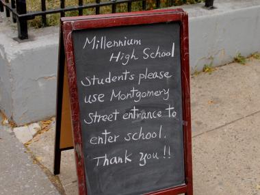 Students from storm-battered Millennium High School resumed classes at the Shuang Wen School on the Lower East Side Wednesday.