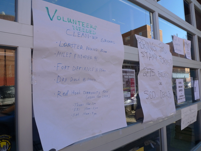 <p>Signs directing volunteers helping with Hurricane Sandy clean-up at Red Hook Initiative.</p>
