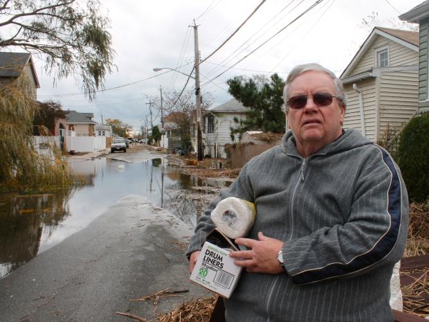 <p>October 31, 2012 - A local man helped his family with supplies on Fox Beach Lane Wednesday.</p>