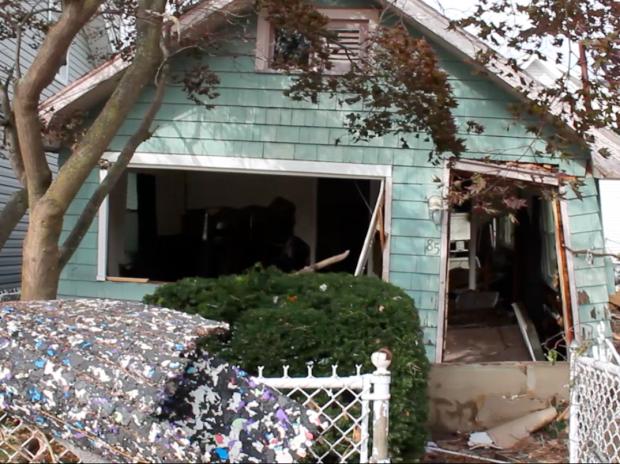 <p>November 1, 2012 - A house on Cedar Grove Avenue lost its garage door and front door in the hurricane, leaving what's left inside vulnerable to looters.</p>