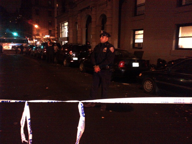 <p>Police and crime scene tape outside the La Rochelle building at 57 W. 75th St., where two children were stabbed on Oct. 25, 2012.</p>

