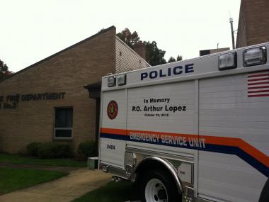 Family and friends gathered to mourn slain police officer Arthur Lopez on Thursday October 25, 2012.