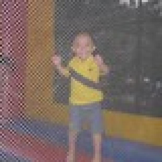 Alexis Espinoza, 3, just may be the bounce house's biggest fan.