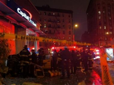 Two women were hospitalized after a cab crashed into a bank at West 69th and Broadway on Saturday night.