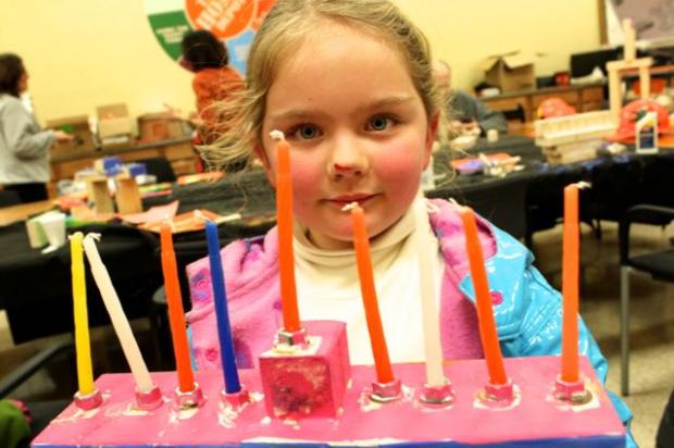  Home Depot hosted a free menorah building workshop Sunday, Dec. 9, 2012 attended by 50 people, according to the  Wicker Park Bucktown Jewish Center  which organized the event.&nbsp; Hanukkah began Saturday night and continues through this weekend. 
