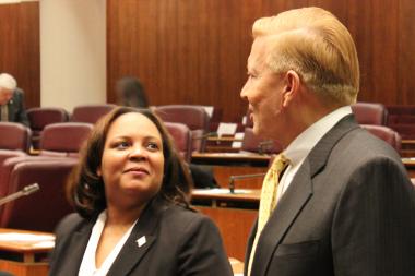  Natashia Holmes chats with Ald. Bob Fioretti before Wednesday's City Council meeting. 
