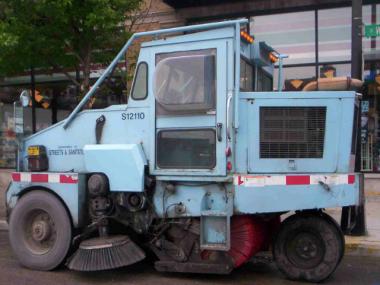  A Chicago street sweeper waits for street cleaning to begin at 9 AM last summer on Wilson Ave. in Uptown.
 