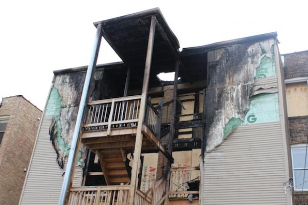  A Lakeview fire displaced 13 residents Sunday night. Monday morning, the sun lit up the damage to the top two floors of the building in the 1200 block of West Roscoe Avenue. 
