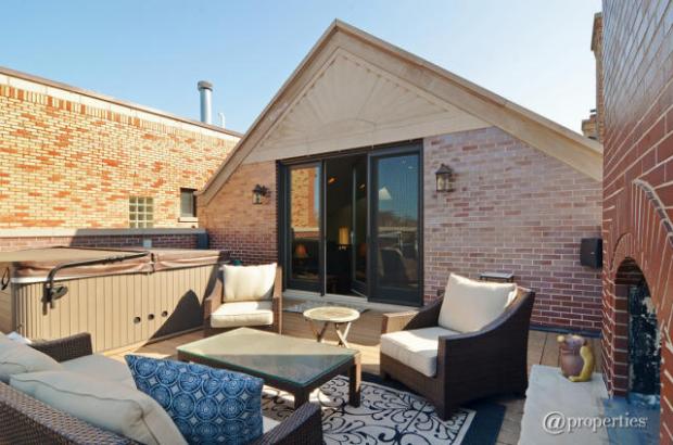  A house newly for sale at 1242 W. Eddy St. &mdash; just between Southport corridor and Wrigley Field &mdash; features a rooftop deck, a patio and plenty of family space. 
