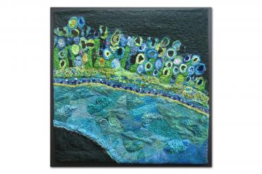  “Edge of the World,” a quilt by Annabel Ebersole, portrays the cellular landscape captured by medical researchers. 
