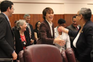  Ald. Deb Mell accepts congratulations from Ald. Deborah Graham as she's seated in the City Council Wednesday. 
