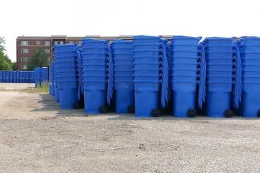  Stacks of blue carts at a city facility are ready for delivery to homes on the far Northwest Side. 
