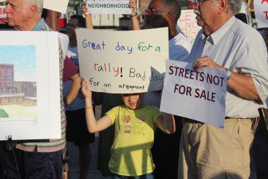  Protesters say they are pro-Cubs, but want more input on plan that will "change our lives." 
