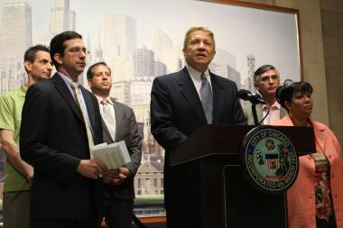  Aldermen Nick Sposato (from l.), Scott Waguespack, John Arena, Bob Fioretti, Ricardo Munoz and Toni Foulkes call on the city to send TIF funds back to CPS. 
