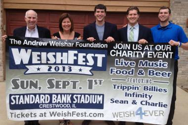  Andrew Weishar's father, Don (from l.); his mother, Jean; brother, Nic; best friend, Parker Carroll; and brother, Danny, hold a poster for Weish Fest, which will take place Sept. 1 at Standard Bank Stadium in Crestwood. Andrew Weishar, a former football star at Brother Rice High School in Mount Greenwood, died from cancer in October. 
