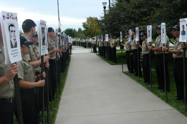  Family, friends, and officers paid tribute to the 567 officers who are memoralized at the Chicago Police Memorial. 
