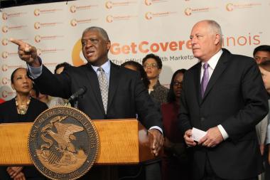  William McNary, co-director of Citizen Action/Illinois, and Gov. Pat Quinn cheered the state's new health-care initiative Tuesday. "We are not going back," McNary said. 
