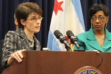  Budget Director Alexandra Holt, seen with Ald. Carrie Austin (r.), chairman of the Budget Committee, says overtime enables the city to put more police on the street. 
