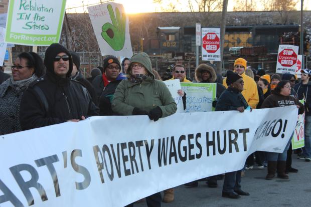  About 100 Wal-Mart employees protested Wednesday on the South Side demanding that full-time employees be paid an annual salary of at least $25,000. 
