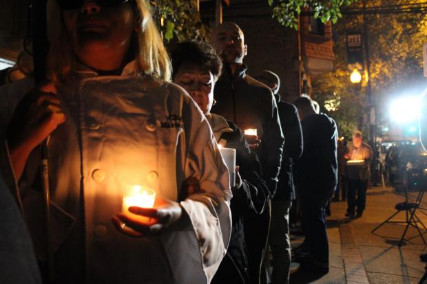   More than 100 mourners touched by Charlie Trotter over the years gathered outside his former restaurant Tuesday night.  
