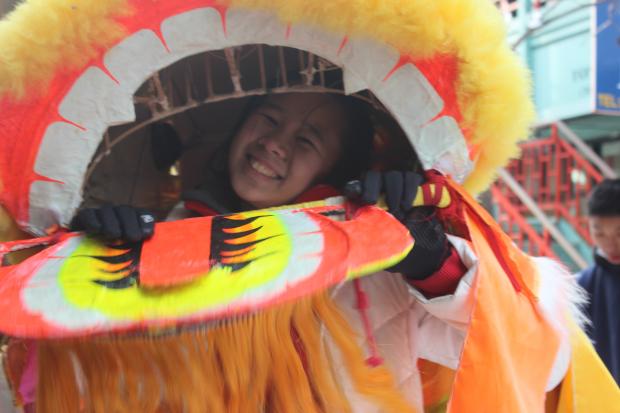   High-flying dragons and traditional lion dancers entertained hundreds of revelers in Chinatown Sunday.  
