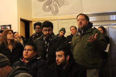  Jerry Mead-Lucero, of Pilsen environmental group PERRO, speaks Wednesday at a community meeting regarding a proposed Helicopter launch pad in Bridgeport. 
