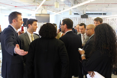  Mayoral aides and 1871 Chief Operating Officer Tom Alexander (l.), a former Emanuel spokesman, lead out CTU officials before Tuesday's news conference. 
